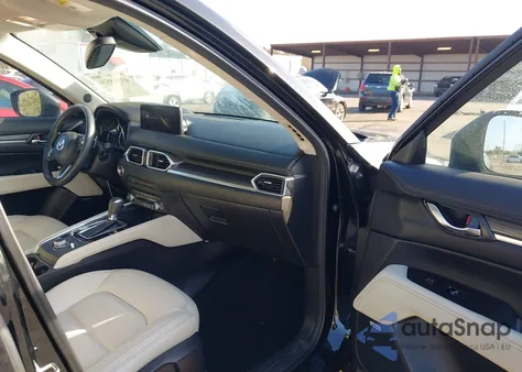 2021 Mazda Cx-5 Grand Touring z USA, uszkodzony, nr VIN JM3KFADM9M0350587